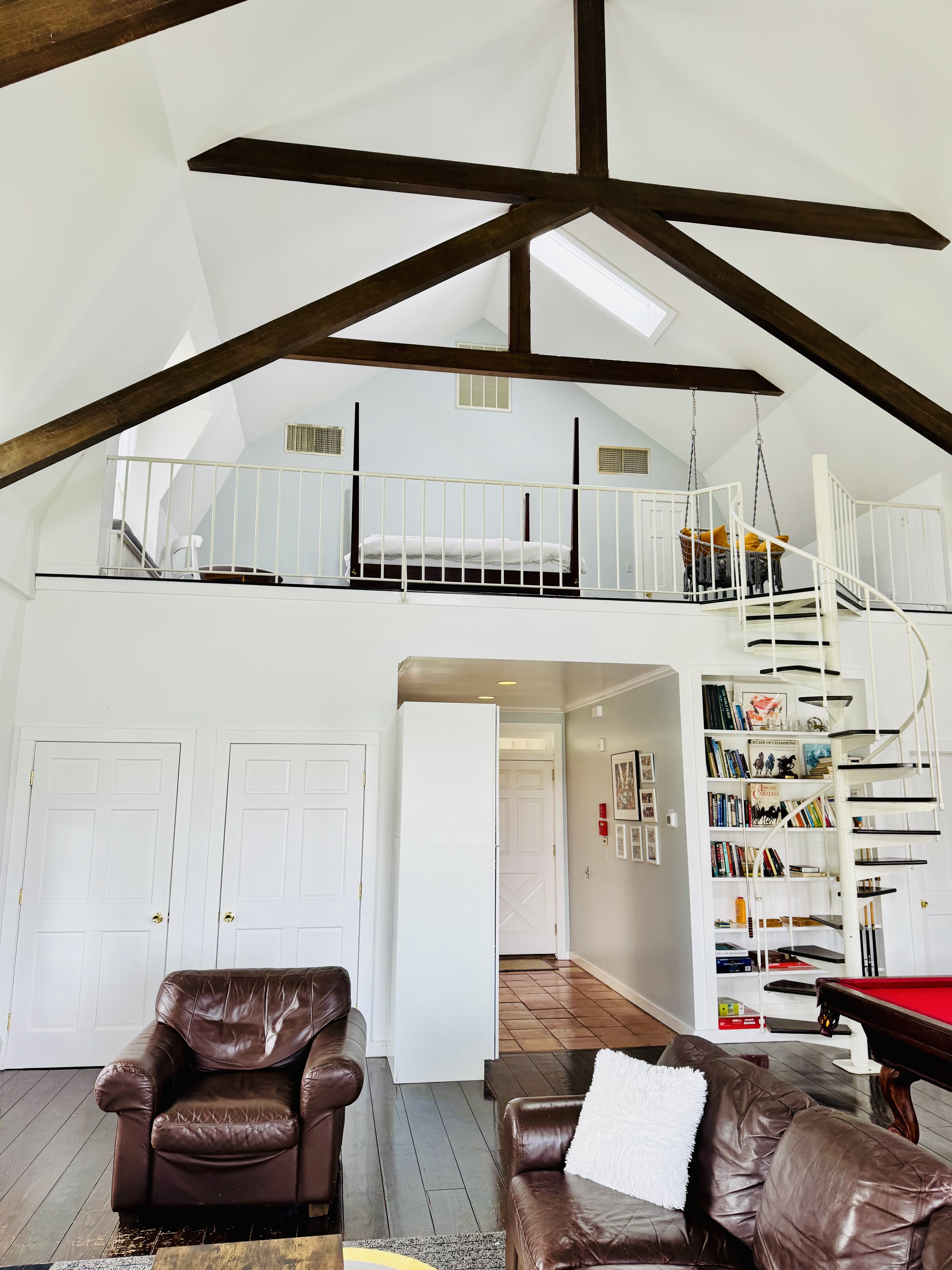 King-size canopy bed on the loft mezzanine